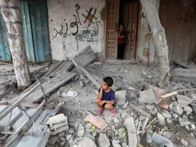 a palestinian boy sits at the site of an israeli strike on a house amid the israel hamas conflict in maghazi refugee camp in the central gaza strip august 14 2024 photo reuters a palestinian boy sits at the site of an israeli strike on a house amid the israel hamas conflict in maghazi refugee camp in the central gaza strip august 14 2024 photo reuters